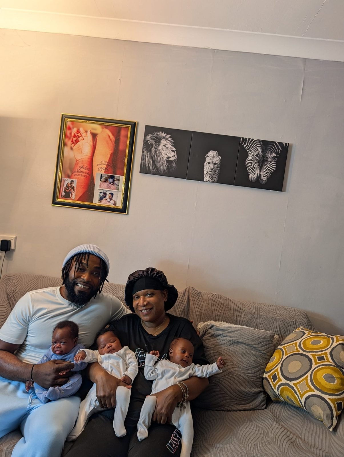 JayJay and Kisha carrying the triplets